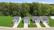 2109 Montalvan Drive, Greenville, NC 27834 — 4-bedroom home in Carter Ridge, Greenville, NC, photo 9 of 52: 9-custom-DJI_20260901130949_0554_D_DH