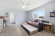 201 Mansfield Parkway, Morehead City, NC 28557 — 4-bedroom waterfront home in Morehead Bluffs, Morehead City, NC, photo 15 of 50: Downstairs Bedroom 1