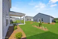 206 Brookfield Branch Drive 29, Hampstead, NC 28443 — 4-bedroom home in Brookfield Branch, Hampstead, NC, photo 8 of 48: 42_backyard