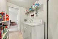1530 Salter Path Road 15, Indian Beach, NC 28512 — 2-bedroom waterfront manufactured home in Tradewinds, Indian Beach, NC, photo 24 of 32: Laundry