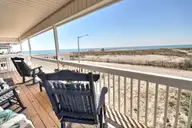 461 E Third Street, Ocean Isle Beach, NC 28469 — 4-bedroom waterfront home, Ocean Isle Beach, NC, photo 11 of 57: PorchView