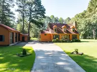 104 Sandpiper Bay Road, Washington, NC 27889 — 3-bedroom waterfront home in Pamlico Plantation, Washington, NC, photo 1 of 65: 001 Main View 104 Sandpiper Bay