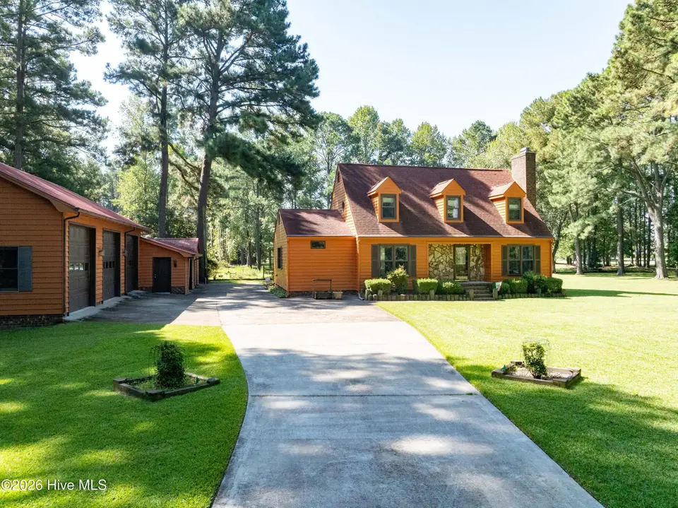 104 Sandpiper Bay Road, Washington, NC 27889 — 3-bedroom waterfront home in Pamlico Plantation, Washington, NC, photo 1 of 65: 001 Main View 104 Sandpiper Bay