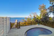 3804 Emerald Drive E, Emerald Isle, NC 28594 — 4-bedroom waterfront townhome in Emerald Isle By The Sea, Emerald Isle, NC, photo 5 of 46: Pool overlooking water