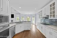 8911 W Telfair Circle W, Wilmington, NC 28412 — 4-bedroom home in The Cape, Wilmington, NC, photo 13 of 34: Kitchen (view 2)