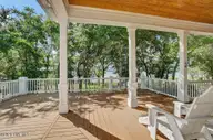 8660 River Road, Wilmington, NC 28412 — 5-bedroom waterfront home, Wilmington, NC, photo 17 of 65: Deck Area from Kitchen