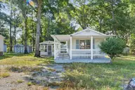 212 Dogwood Drive, Sunset Beach, NC 28468 — 2-bedroom manufactured home in Seaside Station, Sunset Beach, NC, photo 2 of 44: 02-kahunaphoto