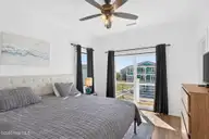 381 E Fourth Street, Ocean Isle Beach, NC 28469 — 5-bedroom waterfront home in Little Beach Landing, Ocean Isle Beach, NC, photo 16 of 62: 381 E Fourth Street