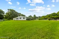 2828 Easy Street, Newport, NC 28570 — 3-bedroom home in Village Heights, Newport, NC, photo 5 of 31: Side