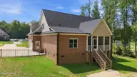 1453 Blue Heron Drive, Nashville, NC 27856 — 3-bedroom waterfront home in The Landing at Cooper Fields, Nashville, NC, photo 8 of 59: 7-web-or-mls-DJI_20260708152358_0586_D