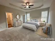 9081 National Avenue NE, Leland, NC 28451 — 4-bedroom home in Parkwood Estates, Leland, NC, photo 9 of 29: primary bedroom 2