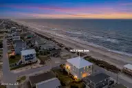1423 N Shore Drive, Surf City, NC 28445 — 5-bedroom waterfront home in Del Mar Beach, Surf City, NC, photo 5 of 75: DUSK 1