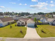 1966 Jeffrey Stokes Drive NE, Leland, NC 28451 — 3-bedroom home in Eastbrook, Leland, NC, photo 3 of 48: 3-web-or-mls-DJI_20260327152603_0271_D