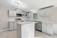 211 Duck Ridge Drive, Pikeville, NC 27863 — 3-bedroom manufactured home in Duck Ridge, Pikeville, NC, photo 3 of 28: 12-211 Duck Ridge Dr-12