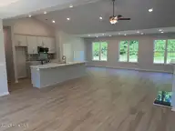 63 Waterfall Lane, Whiteville, NC 28472 — 4-bedroom waterfront home in Waterfall Estates, Whiteville, NC, photo 2 of 22: GREAT ROOM PROGRESS 9