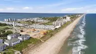 137 Ocean Promenade, Indian Beach, NC 28512 — 5-bedroom waterfront home in The Pearls Oceanside, Indian Beach, NC, photo 15 of 24: 5-print-DJI_20260505162945_0831_D
