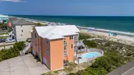 4601 Ocean Drive, Emerald Isle, NC 28594 — 6-bedroom waterfront home, Emerald Isle, NC, photo 2 of 67: 67-web-or-mls-DJI_20250622152308_0141_D