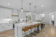 524 Moss Lake Lane, Holly Ridge, NC 28445 — 5-bedroom waterfront home in Summerhouse On Everett Bay, Holly Ridge, NC, photo 14 of 71: 46_kitchen
