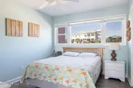 1509 Ocean Drive West, Emerald Isle, NC 28594 — 4-bedroom waterfront townhome in Emerald Isle By The Sea, Emerald Isle, NC, photo 14 of 26: 2 Seas the Day West 003 queen with jack