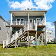 1017 1st Street, Surf City, NC 28445 — 4-bedroom waterfront home in Old Settlers Beach, Surf City, NC, photo 1 of 38