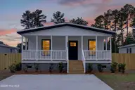 1021 Pine Ridge Court, Castle Hayne, NC 28429 — 3-bedroom manufactured home in Pine Ridge, Castle Hayne, NC, photo 1 of 31: 1021PineRidgeCourt-2_Dusk