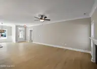 161 Twining Rose Lane, Holly Ridge, NC 28445 — 3-bedroom home in Summerhouse On Everett Bay, Holly Ridge, NC, photo 8 of 62: open living/dining area