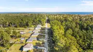 520 Stately Pines Road, New Bern, NC 28560 — 3-bedroom home in Stately Pines, New Bern, NC, photo 11 of 35: 11-web-or-mls-DJI_20251031111003_0570_D