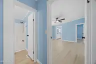 211 Pond Road, Rocky Point, NC 28457 — 3-bedroom manufactured home in Arvida Lands, Rocky Point, NC, photo 21 of 36: 12_hallway