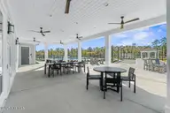 4065 Farmfield Drive, Navassa, NC 28451 — 3-bedroom home in Lakes at Riverbend, Navassa, NC, photo 17 of 22: Cabana Seating