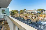 202 Lewis Drive Unit 1207, Carolina Beach, NC 28428 — 3-bedroom waterfront condo in Otter Creek, Carolina Beach, NC, photo 2 of 53: 023-202LewisDrive-1207-CarolinaBeach-NC-