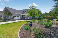 4221 Skeffington Court, Southport, NC 28461 — 3-bedroom waterfront home in St James, Southport, NC, photo 9 of 71: Beautifully Landscaped Site