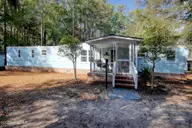 9161 Riveredge Place SW, Calabash, NC 28467 — 3-bedroom manufactured home in Bonaparte Retreat, Calabash, NC, photo 1 of 30: Exterior Front