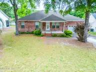 1077 River Drive SW, Calabash, NC 28467 — 3-bedroom waterfront home in Calabash Acres, Calabash, NC, photo 1 of 22: 01.1077RiverDrSWDrone