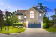 6104 Blue Ray Drive, Leland, NC 28451 — 4-bedroom waterfront home in Grayson Park, Leland, NC, photo 1 of 56: Front Exterior
