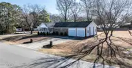 100 Wanda Drive, Pikeville, NC 27863 — 3-bedroom home in Sparrow Point, Pikeville, NC, photo 3 of 34: 100-Frontyard2
