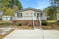635 Dogwood Drive, Sunset Beach, NC 28468 — 3-bedroom manufactured home in Seaside Station, Sunset Beach, NC, photo 1 of 48: DSC01077