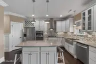 949 Forest Pointe Drive, Sunset Beach, NC 28468 — 3-bedroom home in Sea Trail Plantation, Sunset Beach, NC, photo 23 of 71: Kitchen