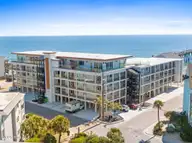 1800 Canal Drive 309, Carolina Beach, NC 28428 — 2-bedroom waterfront condo in North Pier, Carolina Beach, NC, photo 13 of 60: 327_1800_canal_dr_exterior-2_261