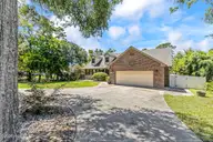 423 Lake Shore Drive, Sunset Beach, NC 28468 — 4-bedroom waterfront home in Twin Lakes, Sunset Beach, NC, photo 4 of 63