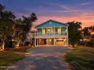 228 NE 52nd Street, Oak Island, NC 28465 — 3-bedroom home in Tranquil Harbor, Oak Island, NC, photo 1 of 61
