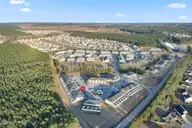 133 W Murrow Lane, Jacksonville, NC 28546 — 2-bedroom townhome in Carolina Plantations, Jacksonville, NC, photo 14 of 55: DJI_0842L