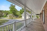 376 Red Fox Run Drive, Wallace, NC 28466 — 5-bedroom waterfront home in River Landing, Wallace, NC, photo 16 of 70: 98_front porch 2.0