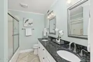 1505 Salter Path Road 235 Summer Winds, Indian Beach, NC 28512 — 3-bedroom waterfront condo in Summer Winds Condominiums, Indian Beach, NC, photo 18 of 46: En suite primary bathroom