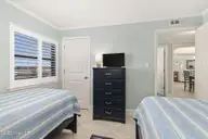 1505 Salter Path Road 235 Summer Winds, Indian Beach, NC 28512 — 3-bedroom waterfront condo in Summer Winds Condominiums, Indian Beach, NC, photo 23 of 46: Guest bedroom 2