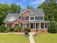 1901 Woodwind Drive, Greenville, NC 27858 — 5-bedroom home in Tucker Estates, Greenville, NC, photo 1 of 55: 1-web-or-mls-DJI_20260526141951_0037_D