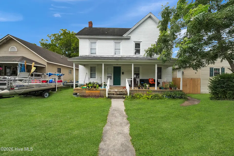 1113 Wood Street, Elizabeth City, NC 27909 — 4-bedroom home, Elizabeth City, NC, photo 1 of 26: 1 with grass