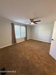 407 Maple Street SW, Shallotte, NC 28470 — 2-bedroom manufactured home in Lakewood Estates, Shallotte, NC, photo 11 of 26: Primary Bedroom