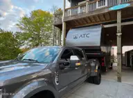 7202 E Yacht Drive, Oak Island, NC 28465 — 3-bedroom waterfront home in Tranquil Harbor, Oak Island, NC, photo 8 of 61: RV and truck