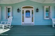 40 Sailview Drive, North Topsail Beach, NC 28460 — 3-bedroom waterfront home in Cape Island, North Topsail Beach, NC, photo 7 of 61: Front Porch