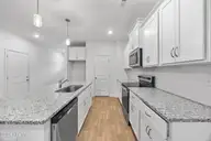 4660 Swimming Lane 62, Shallotte, NC 28470 — 5-bedroom home in Summers Walk, Shallotte, NC, photo 11 of 33: 11_kitchen
